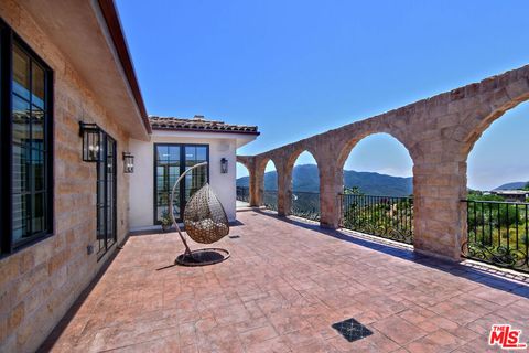 Photo of 33182 Mulholland Highway, Malibu, CA 90265 (MLS # 25531221) Photo of 33182 Mulholland Highway, Malibu, CA 90265 (MLS # 25531221)