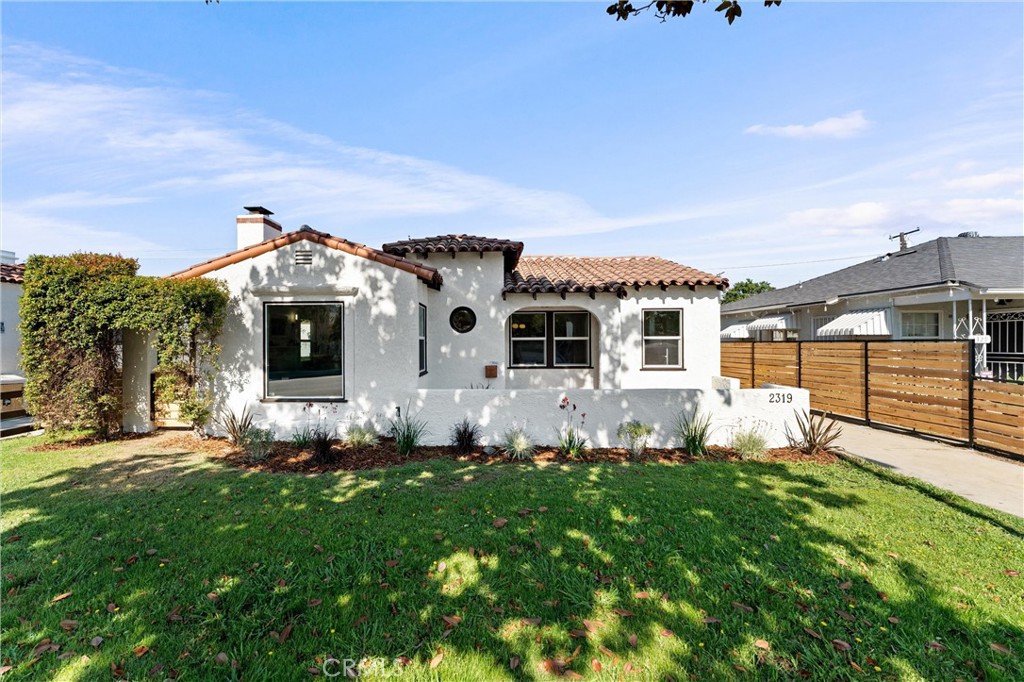 Check out this highly updated Spanish charmer located in the Wrigley neighborhood, this beautifully residence offers the laid-back living you crave! With the warm white toned exterior and a rich red Spanish tile roof these features add to the picturesque curb appeal of this home. Within the 3-bedroom, 2-bath layout, you’ll find a sunlit interior clad in crisp white tones, gorgeous water resistant white oak color flooring and a modern interior style. Whip up delectable meals in the impeccably updated galley kitchen, featuring brand-new stainless steel appliances, great storage in the modern shaker style cabinetry accompanied by quartz countertops with a beautiful blue subway till backsplash to tie it all together. Among your comfortable private retreats, all three rooms have individual ductless climate control for that perfect temperature. The primary boasts a full ensuite bath offering designer finishes and accompanied by a large walk in tile shower. Outside, you’ll love hosting parties in seclusion in the large grassy backyard patio area that offers endless possibilities. Additional inclusions are new ducted A/C heart pump, new windows, updated electrical, roof and a detached extra wide 2 car garage with full pluming and sewer offering great ADU potential! Come take a tour while it’s still up for grabs!