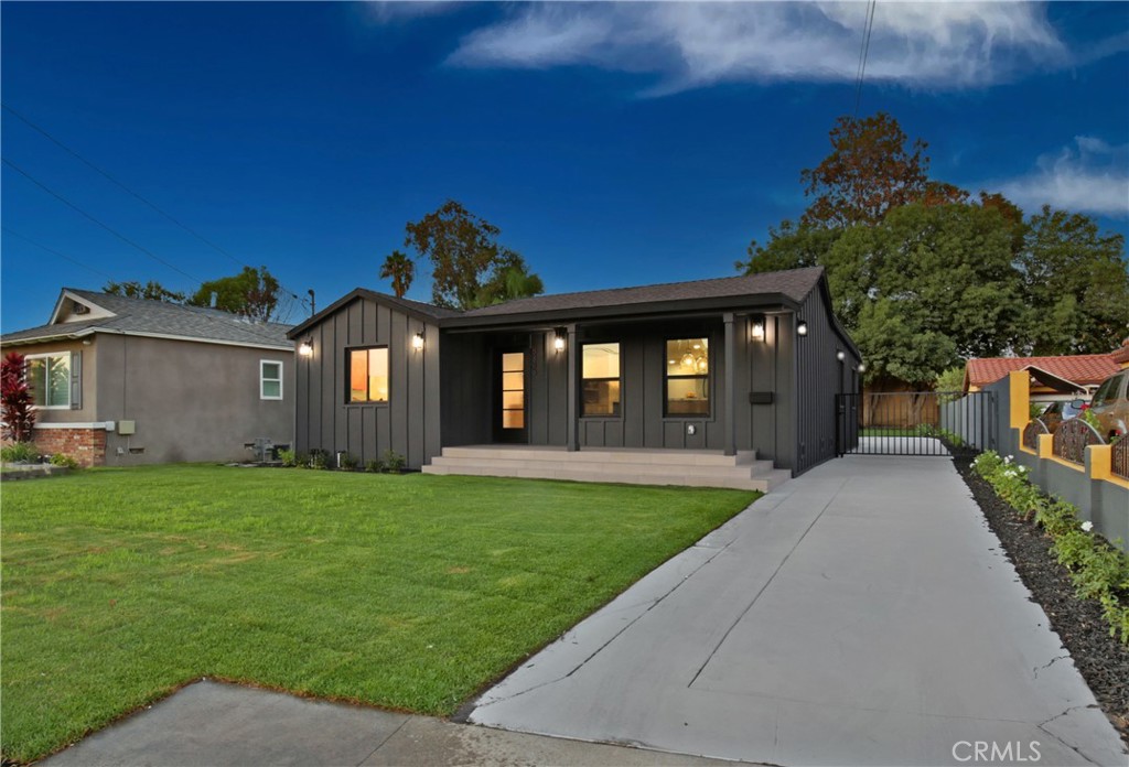 Welcome to this beautifully upgraded 3 bedroom, 2 bathroom home in desirable North Downey. Step inside to find hardwood-style flooring and a stunning open-concept layout where the kitchen flows seamlessly into the formal living room. The chef’s kitchen boasts porcelain counters, premium tile backsplash, designer stainless steel appliances including a 48-inch range/oven, built-in cabinet-ready refrigerator and dishwasher. The living room features a decorative fireplace with custom cabinetry, creating the perfect gathering space. The primary suite offers a custom walk-in closet and a luxurious bath with dual sinks and a full wall-to-ceiling tile shower. The hall bath is equally impressive with elegant travertine walls. The expansive backyard provides endless potential, with ample space for a pool or ADU. Additional upgrades include a new electrical panel, a new central air & heat system, new windows and doors, new tankless water heater, and new automatic sprinklers front & back. Conveniently located near the 5, 605, and 710 freeways, this home combines modern upgrades with a prime location.