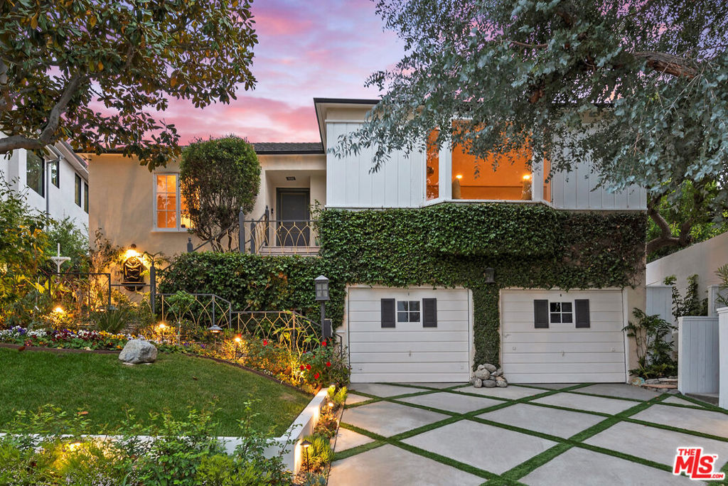 Stunning Fully Furnished Resort-Style Retreat in the Heart of Studio City. This beautifully remodeled and fully furnished 3-bedroom, 3-bathroom single-family home is ready for immediate move-in. Designed with an artistic, high-glamour aesthetic, every detail exudes modern sophistication and comfort. The open-concept chef's kitchen features top-of-the-line appliances, an onyx stone fireplace, and a dramatic skylight that fills the space with natural light. Each room has been thoughtfully styled with high-end finishes and curated furnishings for a seamless luxury experience. Step outside to a private resort-style backyard boasting a heated pool and jacuzzi, outdoor shower, cozy fire pit lounge, tiki bar, koi pond, and tranquil meditation area. The lush landscaping includes 30 varieties of fruit trees lining the property, creating a garden sanctuary that's both beautiful and bountiful. This one-of-a-kind home is ideal for anyone seeking luxury, comfort, and a move-in-ready lifestyle in one of L.A.'s most desirable neighborhoods.