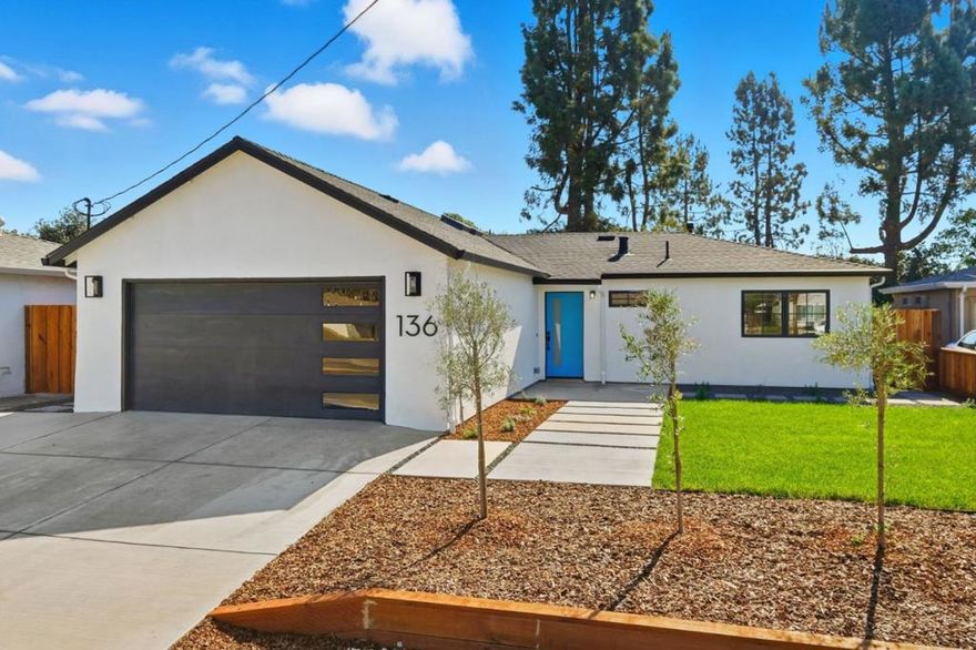 Welcome to 136 Tamarack Drive, a beautifully remodeled and expanded single-story home blending modern design, natural light, and everyday comfort. This 3-bed, 2-bath home offers approx 1,520 sq ft of reimagined living space on a 5,936 sq ft lot, enhanced designer finishes and quality craftsmanship throughout. Step inside to a vaulted-ceiling great room where sunlight floods through new Milgard dual pane windows highlighting the open floor plan and airy contemporary feel. The chefs kitchen features Thermador stainless-steel appliances, including a 36-inch professional gas range, quartz countertops, and custom cabinetryperfect for cooking and entertaining. The dining area includes a built-in wet bar with wine fridge, creating a seamless space for gatherings. The primary suite offers a tranquil retreat with a spa-inspired ensuite bath and generous closet. Both bathrooms showcase modern tilework, premium fixtures, and sleek designer touches. Additional highlights include central heating and air conditioning, a gas fireplace, and a two-car garage. Enjoy a landscaped backyard ideal for relaxation or entertaining. Located in a quiet neighborhood offering easy access to top schools, parks, shopping, and commute routes, a perfect blend of style, comfort, and convenience.