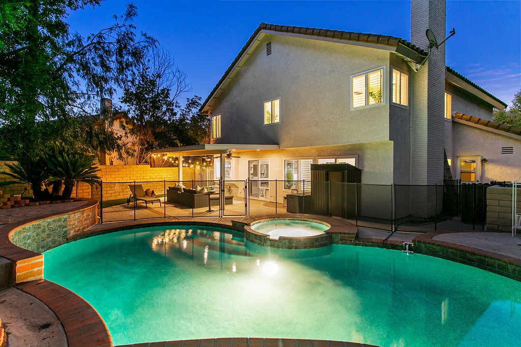 PREMIER LOCATION! This charming home is located in the HIGHLY desirable community of Anaheim Hills! Upgrades galore, this beautiful 4 bedroom, 2.5 bathroom, 3 car attached garage is what you've been looking for! Light and bright open floor plan offers custom improvements, such as the custom fireplace, chefs kitchen, custom plantation shutters, recessed lighting and ceiling fans throughout + MORE. The gorgeous kitchen has a gas range, quartz countertops, custom backsplash and newer stainless-steel appliances. The generous and newly landscaped backyard is perfect for entertaining with the custom NEWLY redone pool, covered outdoor space. The upstairs offers four bedrooms, the primary suite enjoys views of the backyard, large primary bath with large walk-in closet, separate tub and loads of light and bright windows. Three additional bedrooms are very generous in size. The large 3-car garage has room for plenty of storage. Located in a desirable neighborhood with top-rated schools, parks, and convenient access to shopping and dining. This home strikes the perfect balance between an entertainer’s dream and a private retreat. Top of the line quality throughout and truly a MUST SEE property, grab your tooth brush and move right in. LOW TAXES! Hurry, Schedule your private showing today!!