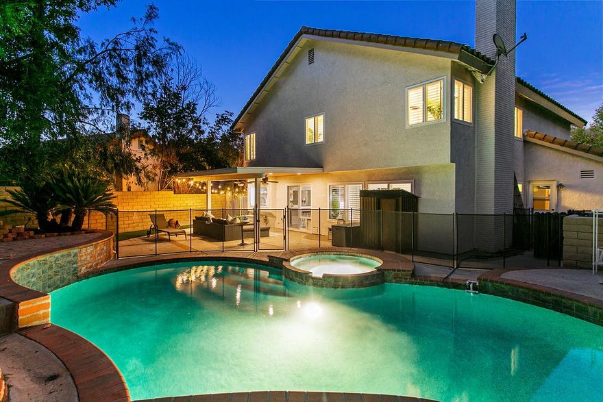 PREMIER LOCATION! This charming home is located in the HIGHLY desirable community of Anaheim Hills! Upgrades galore, this beautiful 4 bedroom, 2.5 bathroom, 3 car attached garage is what you've been looking for! Light and bright open floor plan offers custom improvements, such as the custom fireplace, chefs kitchen, custom plantation shutters, recessed lighting and ceiling fans throughout + MORE. The gorgeous kitchen has a gas range, quartz countertops, custom backsplash and newer stainless-steel appliances. The generous and newly landscaped backyard is perfect for entertaining with the custom NEWLY redone pool, covered outdoor space. The upstairs offers four bedrooms, the primary suite enjoys views of the backyard, large primary bath with large walk-in closet, separate tub and loads of light and bright windows. Three additional bedrooms are very generous in size. The large 3-car garage has room for plenty of storage. Located in a desirable neighborhood with top-rated schools, parks, and convenient access to shopping and dining. This home strikes the perfect balance between an entertainer’s dream and a private retreat. Top of the line quality throughout and truly a MUST SEE property, grab your tooth brush and move right in.  LOW TAXES! Hurry, Schedule your private showing today!!