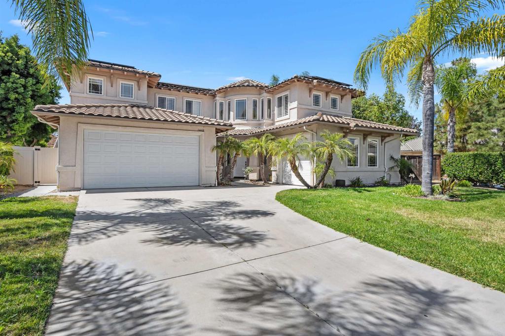 This exceptional residence is situated on one of the largest and most coveted lots in the neighborhood, nestled at the end or a serene cul-de-sac and offering a truly distinguished living experience. Encompassing just over a quarter of an acre, this exquisitely maintained home features four spacious bedrooms and three well-appointed bathrooms, with over 3,000 square feet of thoughtfully designed living space. Inside, the property boasts fresh interior paint, new carpeting, and a versatile lower-level bedroom with an adjacent bathroom. The expansive upstairs primary suite offers a generous walk-in closet and a tranquil retreat, perfect for unwinding. The welcoming backyard serves as a private sanctuary, complete with a stunning pool featuring Baja step, a Jacuzzi, waterfall, and waterslide, ideal for both relaxation and entertainment. The meticulously landscaped grounds include a state-of-the-art outdoor kitchen with Viking appliances, a fire pit, putting green, fruit trees, and paid solar system—perfect for hosting memorable gatherings or enjoying quiet evenings at home. The seamless integration of a spacious culinary area, inviting family room, and an entertainer’s backyard creates an impeccable setting for creating lasting memories with loved ones. Located centrally within one of San Diego’s premier school districts, with Twin Peaks Middle School just a 15-minute walk away, this distinguished home presents a rare opportunity to enjoy the beautiful days of summer in unparalleled style and comfort.