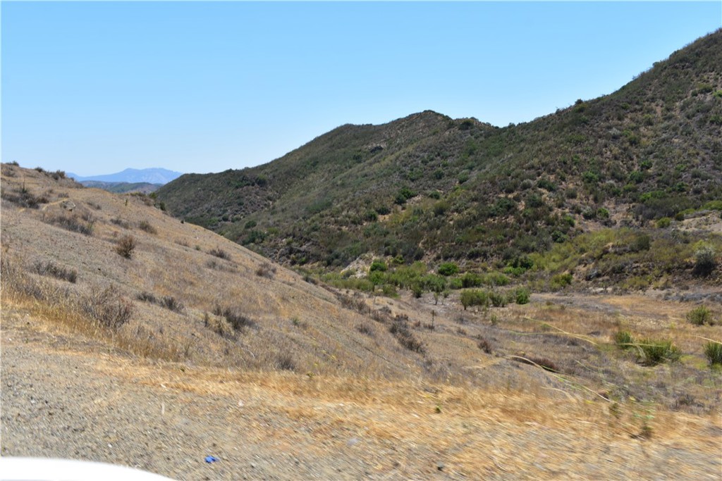 This is a very desirable piece of land located in Agora Hills. 10 Acers of undeveloped vacant land in beautiful Agora Hills with panoramic views of the gorgeous hillside, an investor or developer could capitalize on the location and spectacular views to develop or simply hold as a long term investment.