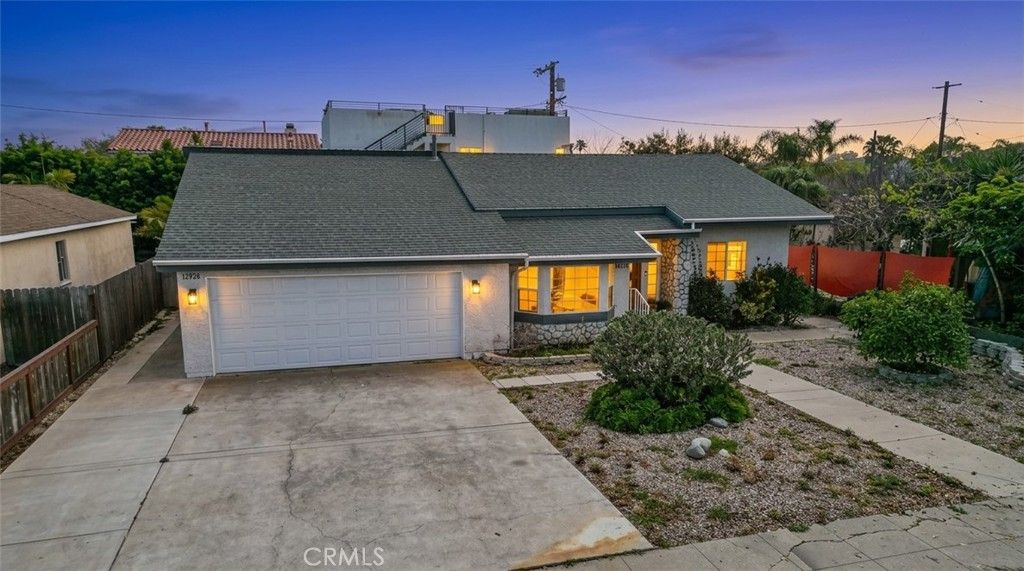 Photo of 12930 Gilmore Avenue, Los Angeles, CA 90066 (MLS # PW25269161)