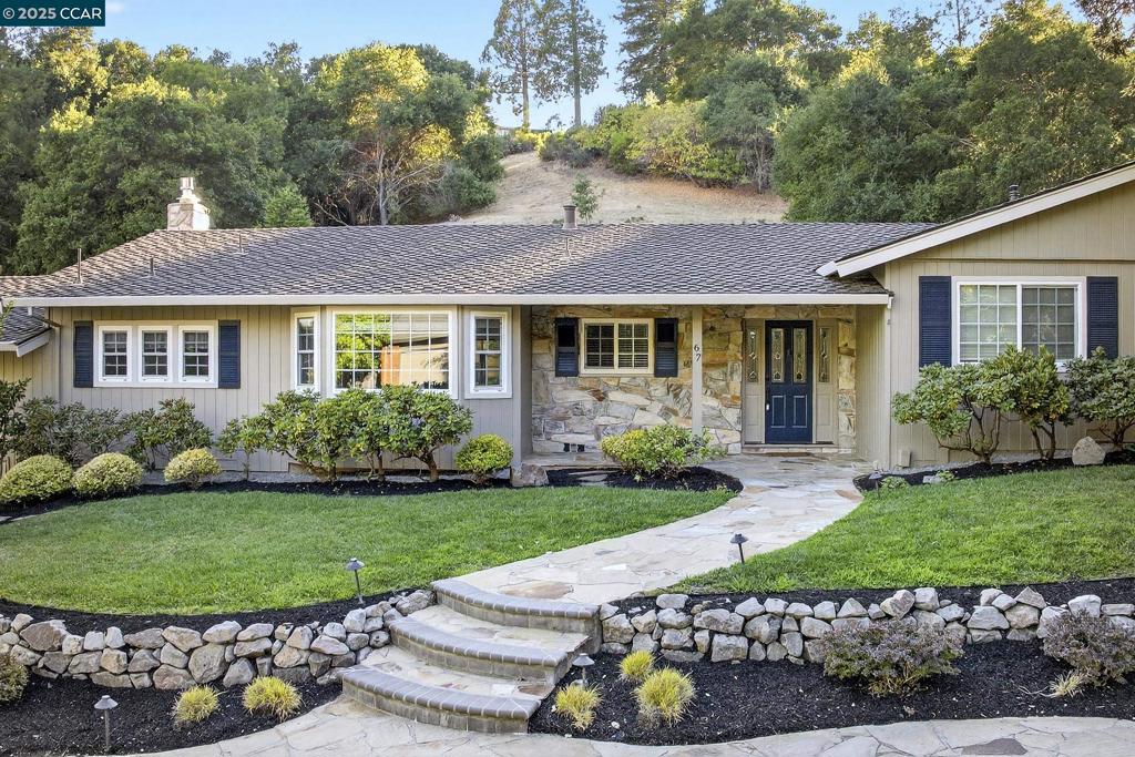 First Opens Saturday (8/23) and Sunday 8/24) from 1 to 4pm. Tucked on a quiet fun and friendly court in the center of Moraga, this beautifully expanded, updated and well maintained home offers 4 bedrooms, 2.5 renovated baths and a recently remodeled kitchen with white cabinets, quartz counters and gas range. The home sits on over an acre of land, affording great privacy in the rear yard, while maintaining a close connection to the neighborhood. The yards are lovingly landscaped, including pavers lush laws, pathways, and a built in grill area. You will find dual paned windows throughout, as well as hardwood everywhere but the baths and laundry. Oversized garage - door just replaced, and the walls have been insulated, sheet-rocked, and painted. Additional parking on driveway. Easy access to Rheem and Moraga centers, The Commons Park, Los Perales School, and all of what quaint Moraga has to offer.