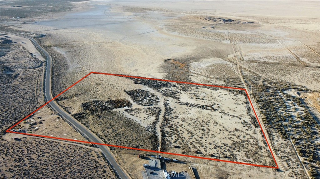 Incredible opportunity to own a massive 30-acre parcel in the heart of Lucerne Valley—priced to sell and packed with potential! Tucked away just enough to enjoy true peace and privacy, yet close enough to town for all your daily needs, this property offers the best of both worlds. This property spans across both sides of the highway, giving you unmatched flexibility for access, layout, and future possibilities. The portion of land that lies across the highway is FULLY FENCED, offering an added layer of security and potential utility. Power poles run along the road for easy electrical hookup, and a gas line directly beneath the property opens up possibilities for future development. There is currently a well on the property, although it is not in use. Imagine your future build or investment surrounded by breathtaking panoramic desert views and dramatic mountain backdrops in every direction. Whether you're looking to invest, build, or hold, this land offers space, location, and opportunity. Priced to sell and backed by a highly motivated seller, this is your chance to invest, build, or dream big in a location that truly has it all. Boundary lines shown in pictures are intended for marketing purposes only. Buyer is to verify all aspects of the property including, but not limited to, utilities, assessments, boundaries, usage, access, and zoning, to satisfy any and all accuracy to information provided or implied.