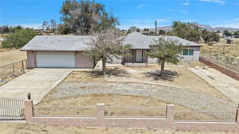 Photo of 15212 Dos Palmas RD, Victorville, CA 92392 (MLS # IV26177003)