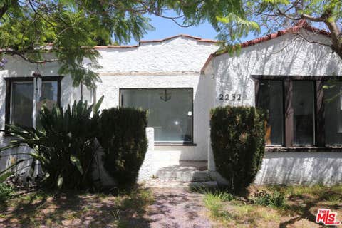 Photo of 2232 S Ridgeley Drive, Los Angeles, CA 90016 (MLS # 26854225)