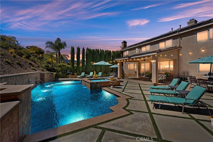 Beautiful Eagle Glen Home with Mediterranean Pool!! Desirable Floor Plan with 3,446 Sq/Ft, 4 Bedrooms, 4 baths, Plus Huge Bonus Room, Office & Solar Powered!!. Highly Upgraded, Island Kitchen Features Stainless Steel Appliances, Jen-Air Stove, Breakfast Bar, Stained Maple Cabinets, DCS Dishwasher, Granite Counters,Travertine Back Splash, Built-In Desk,Recessed Lighting & Wood Beamed Ceiling. "Virginia Vintage Baseboards", Fireplace Mantel. Spacious Family Room w/ Entertainment Niche, Office off Family Room, Wood Plank Floors Throughout Upstairs, Wrought Iron Staircase, Formal Living & Dinning Rooms, Walk-In Closet in Master Bedroom, Frame less Shower, Granite Counters in Master Bath,Huge Bonus Room with Gorgeous Tin Ceiling & Beautiful Wood Wet Bar, Whole House Fan, Ceiling Fans , Salt Water Swimming Pool & Spa with Reef Step & Solar Heating. Stucco Patio Cover with Tile Roof & Ceiling Fan, Diamond Cut Concrete with Artificial Grass Inserts, Charming Courtyard with Huge Fountain & Paver Entry, Custom Wood Front Door, Solar Attic Fans, Block Walls, 9583 Sq/Ft Lot, Built by Lennar Homes in 2000 and Walking Distance to Golf Course, Wilson Elementary School, Park and Grocery Store. Low Taxes, Low HOA!! Great Home For Entertaining, Your Clients Will Love It!