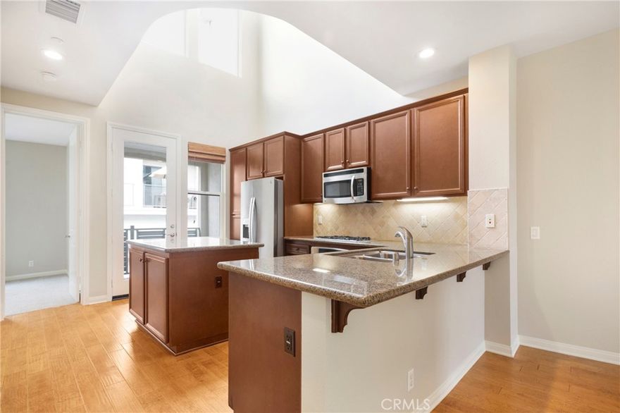 Wonderful two-bedroom, two bath home in the highly sought-after urban community of Vantis. Enter the main floor and be greeted by the open family room,kitchen with built-in breakfast bar and an island, a dining area and first floor bedroom with full bath. Upstairs is a separate tech center perfect for a home office or study area and the master bedroom with an en suite bathroom. NEW CARPET AND PAINT - Vantis community includes a resort-sized pool, spa, gym, playground and clubhouse. Centrally located near shopping, restaurants and the freeway.
