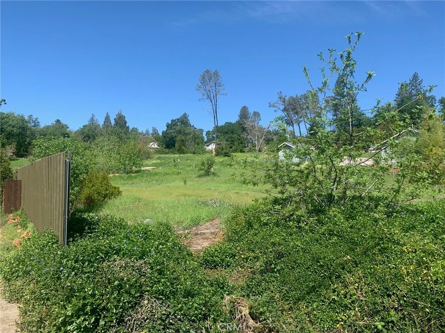 Nice .28 lower paradise lot with partial neighbor fencing in place.  Plenty of sun in a highly desirable area of Paradise.  The septic tank must be replaced, The leach field was tested.  Slight upslope, utilities at street.  Go take a look.