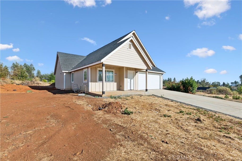 Newly built in 2023 this gorgeous 3 bed 3 bath home needs its first owner! Offering 1,785 square feet of living space on a large 22,216 square foot lot with an open floorplan there are endless possibilities inside and out. Kitchen features quartz counters with brand new stainless steel appliances. Primary retreat with ensuite bathroom and walk in closet is downstairs with the two other bedrooms upstairs. Luxury vinyl flooring throughout with tiled showers. All bedrooms feature ceiling fans and new carpet. Tankless water heater, oven, burners, and furnace use gas, everything else is electric. In the expansive back yard there are two detached structures that can be used as offices, gym, studio, storage, etc the options are endless! Excellent opportunity to own brand new construction on a great lot!