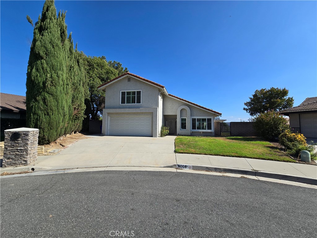 JURUPA VALLEY HOME WITH A VIEW – Welcome to your private retreat! Tucked at the end of a cul-de-sac, this home offers sweeping views and an inviting layout. Step inside to soaring vaulted ceilings and an open-concept living and dining room. Toward the back of the home, you’ll find an updated kitchen that opens to a cozy family room with a fireplace—perfect for gatherings. The three bedrooms are thoughtfully set down the hallway for added privacy. The primary suite features a spacious bathroom and a walk-in closet. Just inside the front door, a staircase leads to the hidden gem of this home—the upstairs loft. This expansive space includes its own built-in bar, making it ideal for entertaining or relaxing away from the main living areas. Out back, the large wraparound deck and multiple seating areas take full advantage of the stunning views, creating the ultimate outdoor living space. Don’t miss the chance to call this one-of-a-kind home yours!