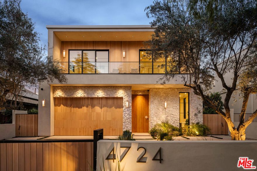 Be the first to live in this brand new 2025 modern masterpiece at 4724 Lemona Avenue, crafted by the acclaimed MLR Development, known for refined craftsmanship, custom design, and meticulous attention to detail. This two-story, 4 bedroom, 4.5 bathroom home embodies elevated California living with sleek lines, luxurious finishes, and seamless indoor-outdoor flow. Step inside to soaring ceilings, an open-concept layout, and a striking floating staircase that sets the tone for modern elegance. The chef's kitchen is a showpiece, featuring built-in Miele appliances, dual electric ovens, a large center island with breakfast bar, and a walk-in pantry. The dining area, illuminated by a sculptural chandelier, opens effortlessly to the spacious family room anchored by a natural stone fireplace and oversized glass sliders. The connection to the outdoors reveals a private backyard oasis with a sparkling pool, spa, and fully equipped outdoor kitchen, perfect for entertaining or relaxing in style. Upstairs, the primary suite offers a private terrace, custom walk-in closet, and spa-inspired bath with a soaking tub and dual vanities. Two additional en-suite bedrooms and a laundry room complete the upper level, while a first-floor guest suite provides ideal flexibility for a home office or gym. Throughout the home, wide-plank golden oak floors, Venetian plaster walls, and floor-to-ceiling windows fill each space with natural light. Set on a picturesque tree-lined street in the heart of Sherman Oaks, this never-lived-in residence delivers modern sophistication, architectural excellence, and an exceptional quality of life. Property is unfurnished.