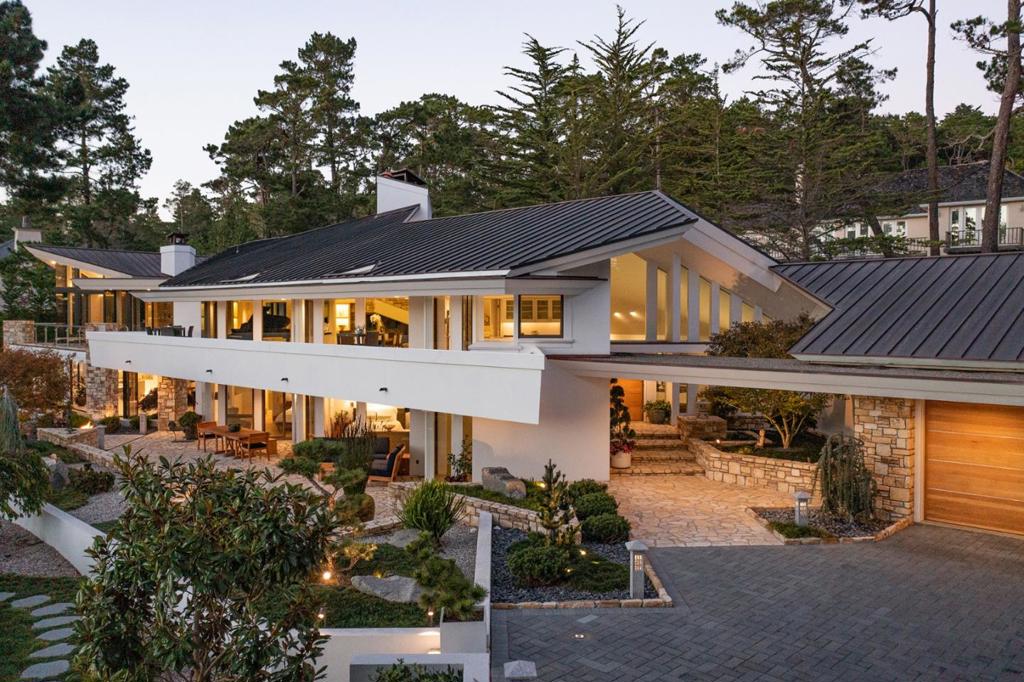 This one-of-a-kind architectural gem, originally designed by Aaron Green, protégé of Frank Lloyd Wright, was completely renovated by Stocker & Allaire in 2018. The home features walls of glass and cantilevered eaves, decks and roofs. The upper level has access to a large southwest facing deck and combine the main living space under a cathedral ceiling with a powerful fireplace as the focal point. The lower level includes 3 bedroom suites each with access to the patio. Across the glass bridge, youll find a sophisticated sitting room, large sun deck and private primary retreat with a dreamy custom closet and luxurious bathroom. Downstairs is an indoor / outdoor sanctuary with massive bi-folding doors that open to a heated terrace, detached gym and in-ground pool. This spacious room includes a sleek juice bar and a full spa bathroom. This masterfully redesigned home remains true to its architectural heritage. There is simply nothing else like it.