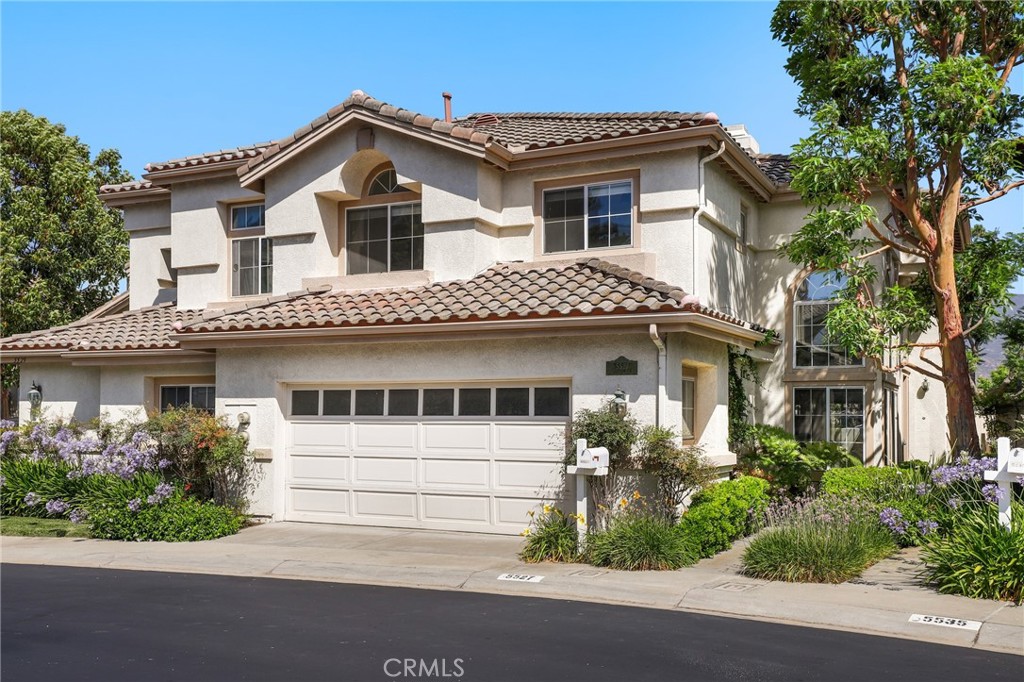 Welcome to 5527 Patricia Way, a beautifully updated home nestled in the highly desirable La Terraza community of Yorba Linda. This light-filled residence offers an inviting sense of space, with rainbows dancing throughout the day thanks to thoughtfully placed windows and decorative glass light fixtures. The open and airy floor plan is enhanced by vaulted ceilings, excellent natural flow, and refreshing cross breezes. The formal living and dining rooms create an elegant setting for gatherings, while the cozy family room—with fireplace and direct access to a private, covered patio—is ideal for everyday comfort. Enjoy mountain views out back and peaceful privacy throughout. The updated kitchen features granite countertops, stainless steel appliances, and a reverse osmosis water filter, all opening to a casual dining area that flows seamlessly into the family room. Downstairs includes a guest powder room, an interior laundry room, and direct access to the attached two-car garage. Upstairs, the primary suite is a tranquil retreat with vaulted ceilings, stylish ceiling fan, mountain views, and a spa-like ensuite bathroom featuring an oversized soaking tub, separate walk-in shower, dual vanities, and a generous walk-in closet. Two additional bedrooms and a pristine hall bath with dual sinks complete the upper level. Upgraded tile and genuine hardwood floors run throughout the home, complemented by modernized stair railings and lighting fixtures. Additional premium upgrades include a brand-new HVAC system, Halo 5 whole-house water filtration and conditioning, all new plumbing, and custom top-down bottom-up window treatments. La Terraza offers resort-style amenities with two sparkling pools, two spas, and a versatile sport court for tennis, pickleball, or basketball. Enjoy direct access to nearby walking and biking trails, Bryant Ranch Park, and top-rated schools including Bryant Ranch Elementary, Travis Ranch Middle, and Yorba Linda High. This is the one you’ve been waiting for—comfort, style, and a vibrant community in Yorba Linda.