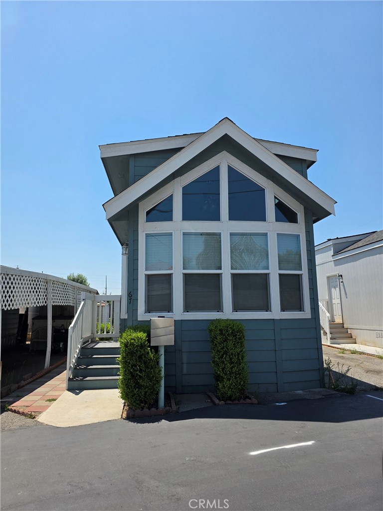 Consider looking into prefabricated or modular homes, which are becoming increasingly popular and can be customized to include desired features like stainless steel appliances and potentially be two-story with one bedroom and bathroom. space 67