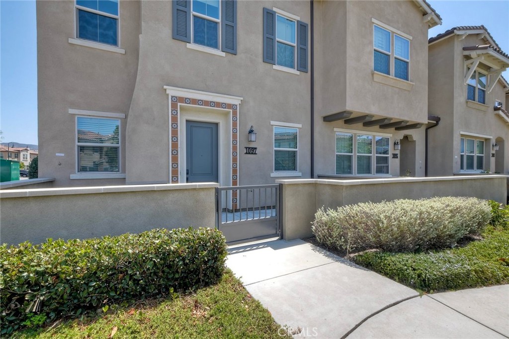Welcome to The Peak gated resort community located walking distance to shops, restaurants, schools, & Botanical Gardens. This new community is also close proximity to beaches and centrally located between the 76,78, and 15 freeways. An additional perk is that it is VA/ FHA approved and no Mello Roos. Energy efficient upgrades include dual-paned windows, designer blinds, LED lighting, tankless water heater, solar panels, 2 separate 220 charging outlets in the garage for electric vehicles, and whole house fan for improved air quality. Its open concept boasts high ceilings, natural lighting and rooms that blend seemingly to give a grand first impression. The home is lined with luxury vinyl flooring and freshly painted interior. Kitchen include stainless appliances, quartz counters, designer backsplash. As we enter the second level, there are three bedrooms with the master suite showcases dual sinks and large walk-in closet. The laundry room is also located upstairs and offers both gas/electric connections for washer/dryer. A bonus feature is the nice size loft can be converted into a fourth bedroom or office. For downtime and relaxation, this home is a short walk across to a resort-style pool/spa, fire pits, and multiple BBQ stations for the ultimate California lifestyle. This home is IMMACULATE and move-in ready!