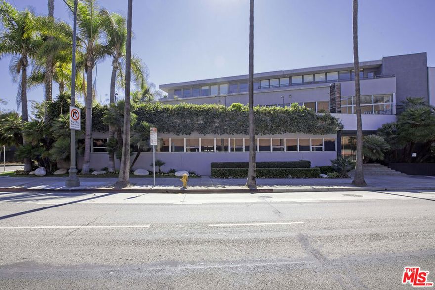 Occupying 3,382 rentable square feet within an 18,618-square-foot building, this light-filled penthouse offers a bright, welcoming environment ideal for both traditional office and creative use.Access the space directly via elevator into the reception area or through either of the two staircases. The layout features a spacious bullpen area accommodating up to seven desks, seven private offices, and a dedicated copy room. A large, sun-drenched conference room located off the reception overlooks a private balcony - perfect for meetings or moments of fresh air. The suite also includes a private bathroom and a small kitchen for added convenience. Three dedicated parking spaces are located directly behind the building.