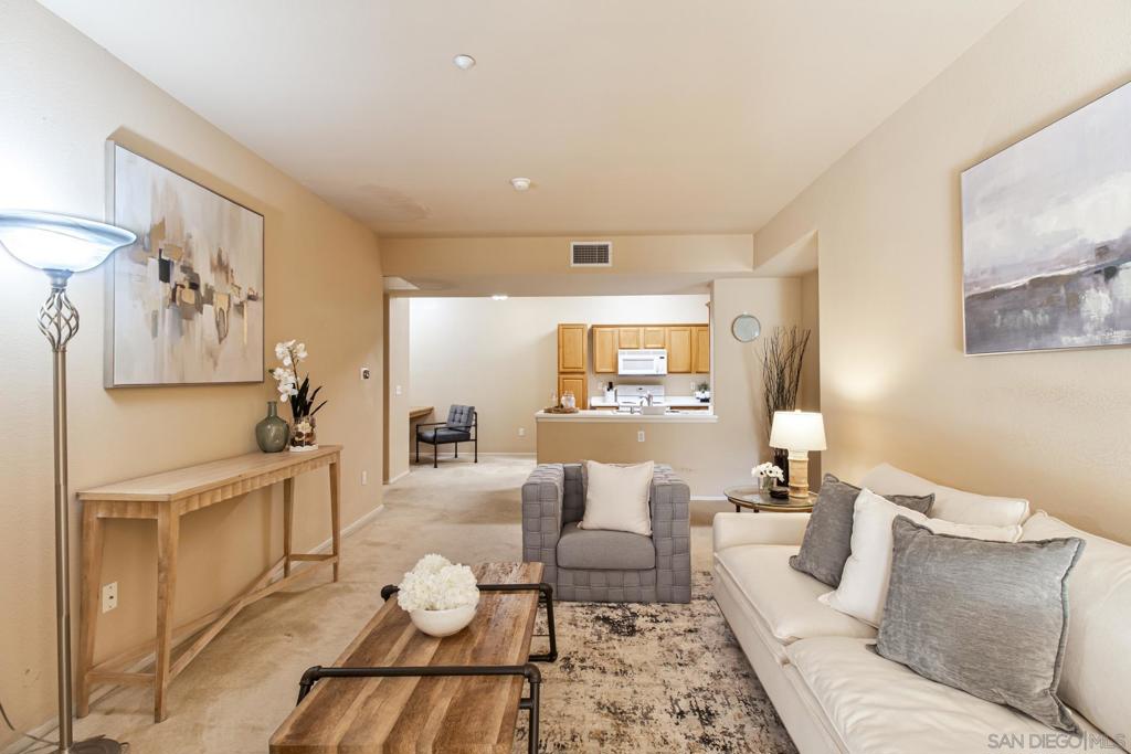 Step into this welcoming 3-bedroom, 2-bath condo offering 1,232 sq ft of comfortable living inside an amazing gated community. The open floor plan creates an inviting atmosphere from the moment you enter and also includes an attached 2 car garage and exclusive use outdoor space! This well maintained home includes a newly installed commercial grade A/C unit and water heater as well as new garage door mechanics for added peace of mind. The community features resort-style amenities including a sparkling pool, fitness center, playground, and clubhouse—perfect for both relaxation and entertainment. Conveniently located near top-rated schools, shopping, dining, and easy freeway access, this home blends comfort, convenience, and lifestyle.