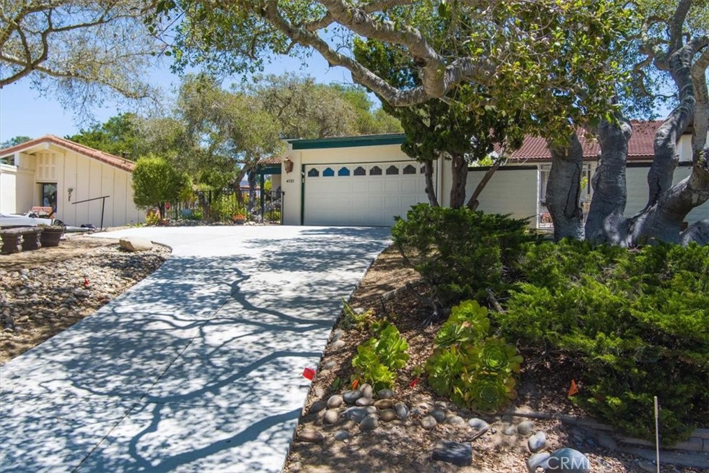 Discover your dream home in this beautifully updated, single-level spanish style home,perfectly situated on the 8th hole of the golf course—without the burden of a homeowners association! This charming 3-bedroom, 2-bathroom home offers a spacious 1,684 square feet of living space, nestled in a peaceful cul-de-sac, making it an ideal retreat for those seeking both comfort and convenience. Step inside to find a harmonious blend of classic design and modern amenities. The home boasts high-quality wood like tile flooring throughout, leading you to a modern kitchen equipped with quartz countertops, a farmer's sink, a walk-in pantry, and a custom tiled backsplash featuring a pot filler above the five-burner stove. Black stainless steel appliances complete this stylish kitchen, perfect for culinary enthusiasts. The inviting living room features soaring vaulted ceilings with a wood design and skylights, enhancing the bright and airy atmosphere. A cozy stone tiled wood-burning fireplace adds warmth, making it the perfect place to gather with family and friends. The master suite, where you'll find two spacious closets, vaulted ceilings, and a skylight that bathes the room in natural light. The upgraded master bathroom includes a newer vanity and a luxurious walk-in shower. The hallway bathroom has also been thoughtfully remodeled with a newer vanity and a walk in shower. Additional upgrades include a new sewer line, a new driveway, a tankless water heater,dual-pane windows,newer furnace, and custom blinds throughout. Enjoy built-in storage in the hallway, upgraded slider doors, and an outdoor shed for extra storage space.
Located just minutes away from the Mission Club Golf Course, this home offers optional membership access to a variety of amenities, including a neighborhood clubhouse, renovated pool, a full gym, updated basketball and pickleball courts, and an on-site golf course restaurant.
Don't miss this rare opportunity to own a move-in-ready home in a prime location!! schedule your showing today!