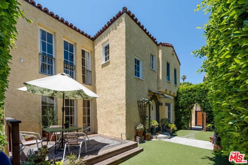 Spacious, light-filled, and charming upper unit with vintage details and beautiful updates in an ideal location, near Sunset and Silver Lake Blvd. There are stunning city and mountain views, high ceilings, abundant natural light from the French windows, and beautiful hardwood floors. A stylish cook's kitchen has quartz counters, custom cabinets, a breakfast bar, and an adjacent ample dining room. There is an inside laundry with front-loading units. The unit may be leased unfurnished or furnished.