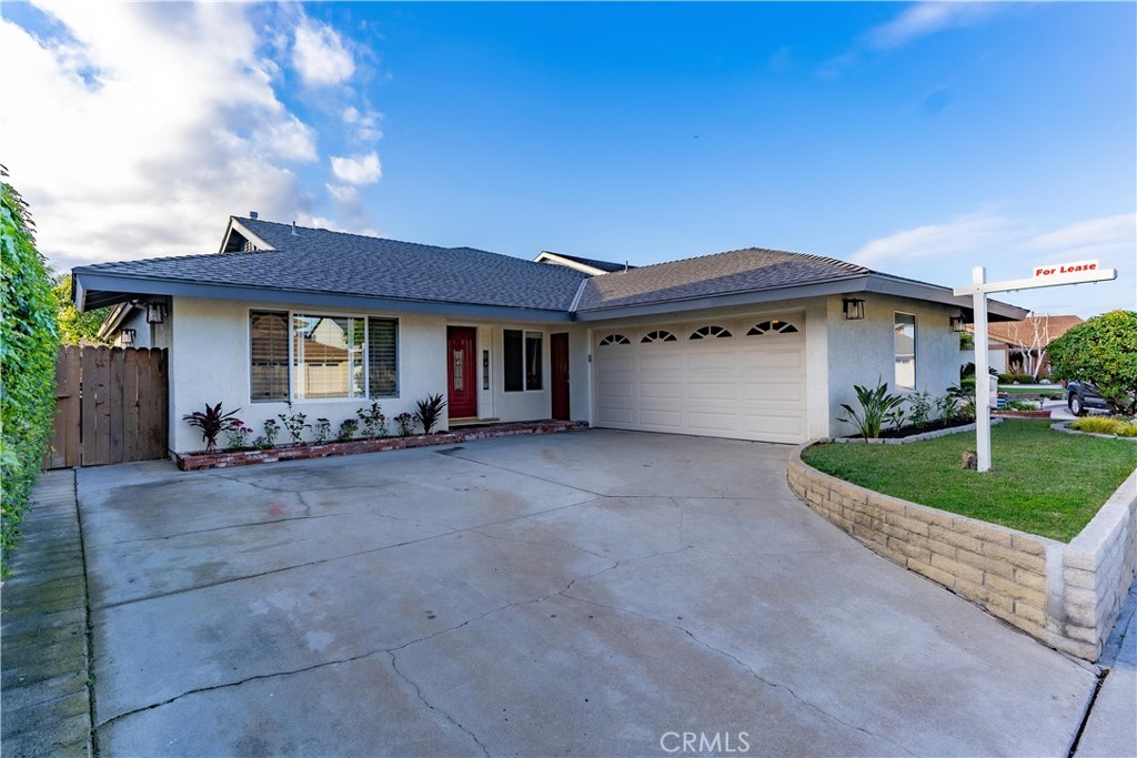 Welcome to this remodeled and expanded Franciscan Fountain home, nestled on a quiet interior street. The inviting curb appeal features a welcoming front porch and neutral color palette. Inside, three oversized living areas offer ample space for family and friends. The main floor boasts a formal living room, a den with fireplace and vaulted ceilings, and an updated kitchen/dining area adjacent to convenient inside laundry. All bedrooms are on the main floor, including three secondary bedrooms and a primary suite with a walk-in closet and an updated bathroom. Upstairs, a large bonus room serves as a perfect hangout, office, or guest space. Enjoy new interior paint throughout and new low-maintenance LVP flooring on the first floor. The backyard features a stone fire pit, seating, and space for gardening or entertaining. This lovely home is close to award-winning schools, Huntington Central Park, local beaches, and popular shops and restaurants.