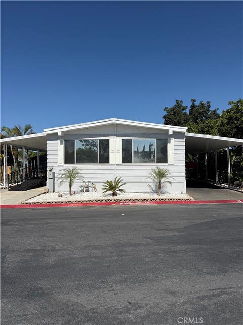 Photo of 995 Pomona Rd#3 RD, Corona, CA 92882 (MLS # CV26156769)