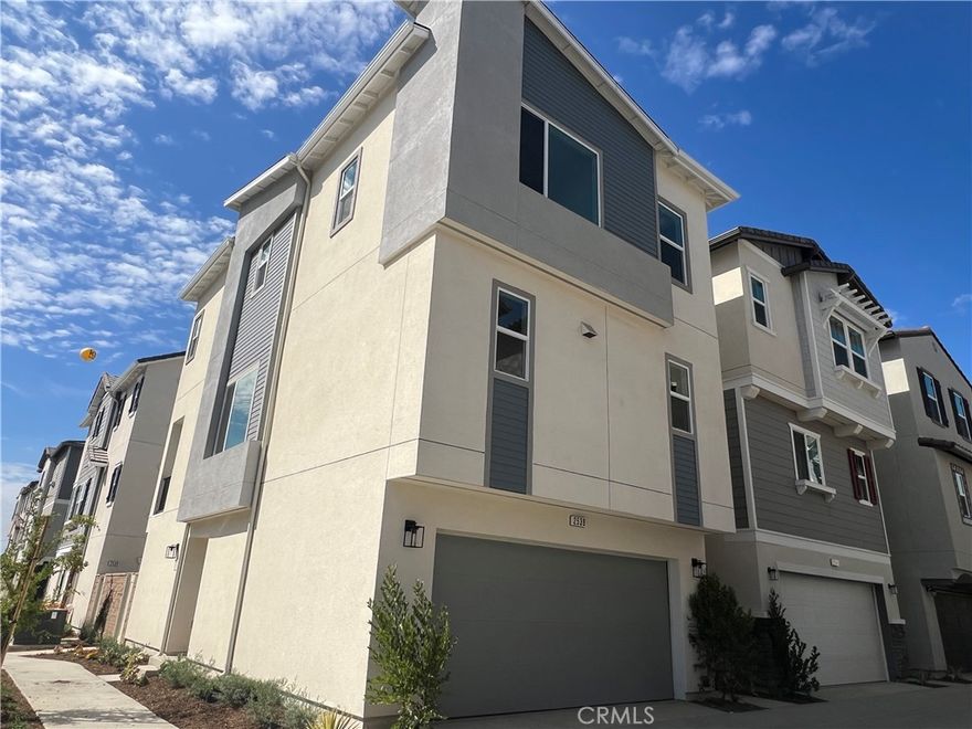 Located in a brand-new, gated new-home community in South El Monte, this detached, three-story home sits in a desirable end location and includes a private, low-maintenance yard for outdoor living. The flexible floor plan offers 4 bedrooms and 3.5 baths.



The first floor features a private bedroom with a full bath and sliding glass doors that open directly to the yard—ideal for guests, multigenerational living, or a quiet home office. The main level presents an open great room connecting the dining area and a modern kitchen with  stainless-steel appliances—perfect for daily life and entertaining.And a well-sized balcony for enjoying fresh air or outdoor relaxation.



Upstairs, the primary suite includes a walk-in closet and dual-sink vanity, plus two additional bedrooms, a convenient laundry area.



Community amenities are planned to open in the near future, including a pool and spa, recreation center, and landscaped walking trails—all within a secure, gated neighborhood (amenities and timelines per builder/HOA; subject to change—tenants to verify). Conveniently located near schools, shopping, golf, and major freeways for commuter-friendly access.