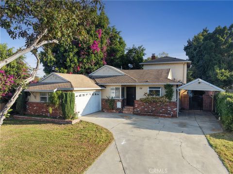 Photo of 7205 Glencliff Drive, Downey, CA 90240 (MLS # DW26064672)