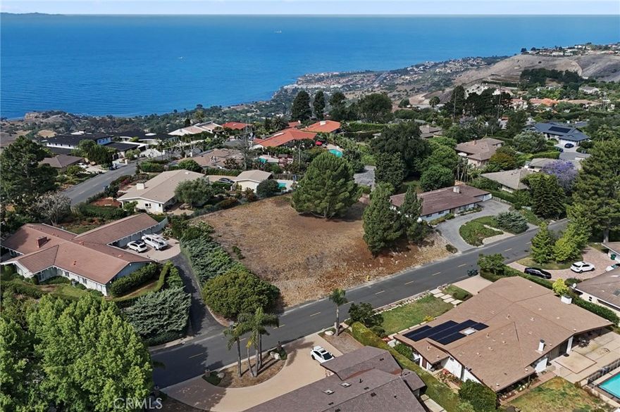 A Rare Slice of the South Bay—Untouched, Elevated, and Ready to Inspire

In a neighborhood where every street is spoken for and every view has long since been claimed, 6 Coveview is the unicorn you didn’t think existed—until now.

This nearly half-acre parcel sits proudly in the heart of Rancho Palos Verdes, surrounded by established homes, yet somehow still untouched. It boasts over 150 feet of frontage and an elevated pad roughly 6–10 feet above street grade—translation: prime positioning for a show-stopping future home with commanding presence and potential views to match.

Now, here’s a little backstory for the romantics and radio nerds alike: back in the 1970s, the original buyer scoured the South Bay for one thing—altitude. Why? To run a ham radio, the OG form of wireless communication. No cell phones, no towers, just signal and sky. They found this lot—and though it was never developed, they knew it was special. Decades later, it still is.

Let’s talk possibilities: this flat, buildable lot offers endless options—dream estate, ADU, guest house, pool, sport court, putting green... go ahead, bring your architect and your vision board. With its impressive width and elevated setting, the design potential is as big as the lot itself.

And while we won’t promise an ocean view (yet), you’ll absolutely enjoy ocean breezes and sweeping city views—plus the feeling of space and sky that’s increasingly rare on the Peninsula.

In short? It’s flat. It’s rare. It’s surrounded by multi-million-dollar homes and it’s never been built on. If you’ve been waiting for the perfect canvas in RPV, this is the plot twist your story’s been missing.