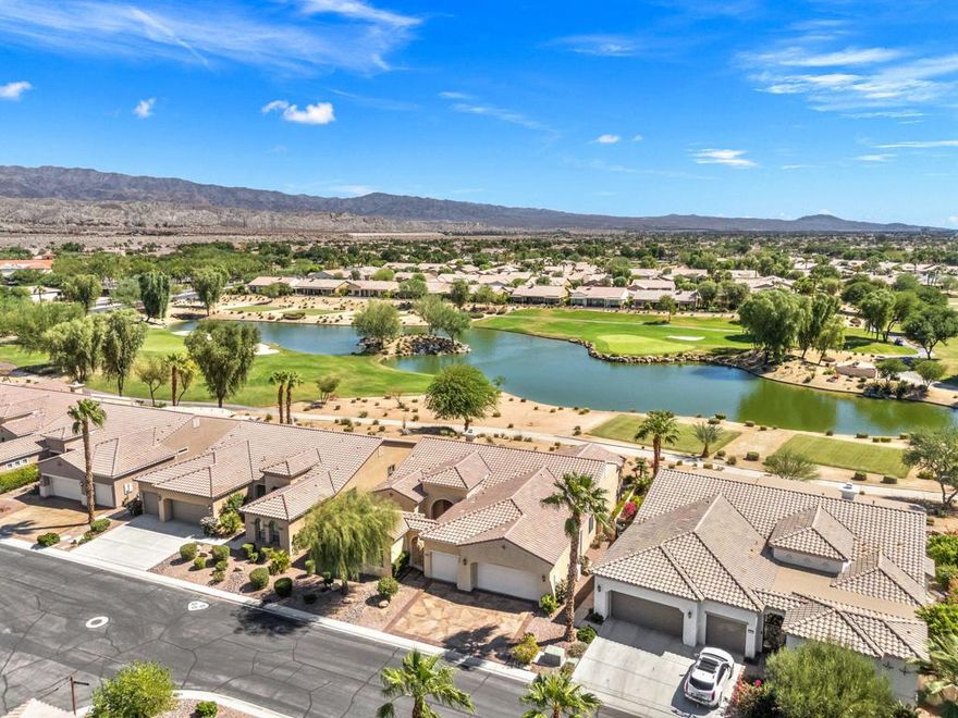 Surrounded by mountains, lush fairways, sparkling lakes, waterfalls, and endless sunshine - this La Paz home has it all!  Offering 3 bedrooms, 3.5 bathrooms, with a private casita, the sought-after great room floorplan makes this home perfect for both relaxation and entertaining.Elegant upgrades add warmth and style throughout: tile flooring in all but the bedrooms, crown molding, and custom woodwork at the great room half wall, fireplace, and kitchen island.  The kitchen shines with antiqued cabinetry, slab granite counters, stainless appliances, under-cabinet lighting, and convenient pull-out shelving.The spacious primary suite features plantation shutters, direct patio access, and a large walk-in closet.  The luxurious bath boasts dual sinks, slab granite counters, an over-sized tub and a large stall shower.  The guest suite is equally inviting with plantation shutters, a tub/shower, and granite counters.French doors open from the private casita to the gated courtyard - perfect for guests.  A well-appointed laundry room includes abundant storage and a utility sink.  The 3-car air-conditioned garage provides plenty of room for storage, hobbies, or even a golf cart.This La Paz home combines style, comfort, and desert living at its best!