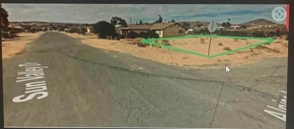 Large corner lot in an established neighborhood. Just minutes from Hwy 62 - a short drive to Joshua Tree and Yucca Valley. Property is close to retail shops, restaurants and Tortoise Rock Casino, a local entertainment venue
