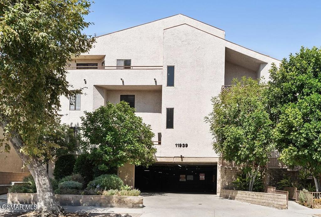 Welcome to 11939 Weddington #313 -- a beautifully updated top-floor end unit nestled in the heart of Valley Village. This spacious 2-bedroom, 2.5-bathroom townhome combines modern upgrades with a thoughtfully designed floor plan for both comfort and style.Soaring vaulted ceilings enhance the light and airy ambiance, while the freshly painted interior, brand-new carpet, and expansive balcony create an inviting living space. The remodeled kitchen features new quartz countertops and stainless steel appliances, offering a sleek and functional culinary experience. Upstairs, a stylishly updated bathroom with a new quartz vanity adds a touch of luxury.Downstairs, you'll find the generously sized primary suite with a remodeled en-suite bathroom and large walk-in closet, along with an additional bedroom and a second fully remodeled bathroom. A dedicated laundry area with side-by-side washer and dryer provides added convenience.Additional features include side-by-side assigned parking in a secure gated garage, complete with overhead storage. The well-maintained building offers secured entry, an updated lobby and hallways, lush landscaping, and a large pool and spa. HOA dues cover cable, internet, water, and trash.Ideally located near major freeways, shopping, dining, and nightlife, this turnkey townhome delivers comfort, convenience, and lifestyle in one of Valley Village's most sought-after communities.