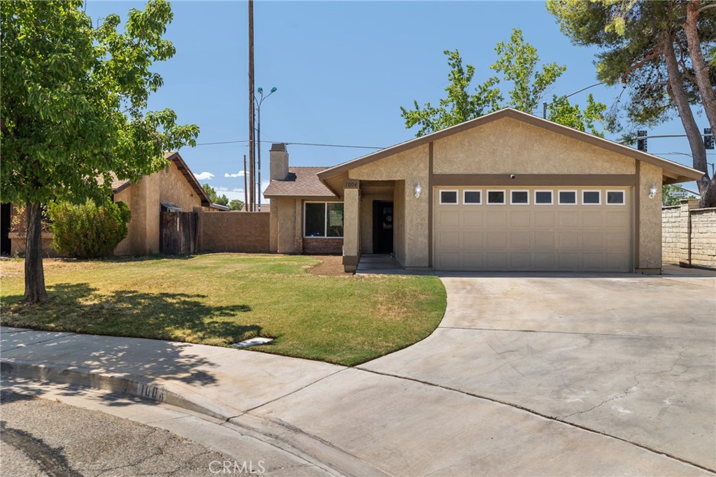 Welcome to this turnkey 2-bedroom, 2-bath home located at the end of a cul-de-sac in Lancaster. This well-maintained property features 1,148 sq ft of comfortable living space, including upgraded flooring throughout and a stylish kitchen with a convenient breakfast bar perfect for casual dining or entertaining. The spacious living area includes a cozy fireplace, creating a warm and inviting atmosphere. Both bedrooms are generously sized, and the home includes two full baths. Enjoy the well-maintained front yard, an extended driveway, and a 2-car attached garage. Don't miss out schedule your showing today!