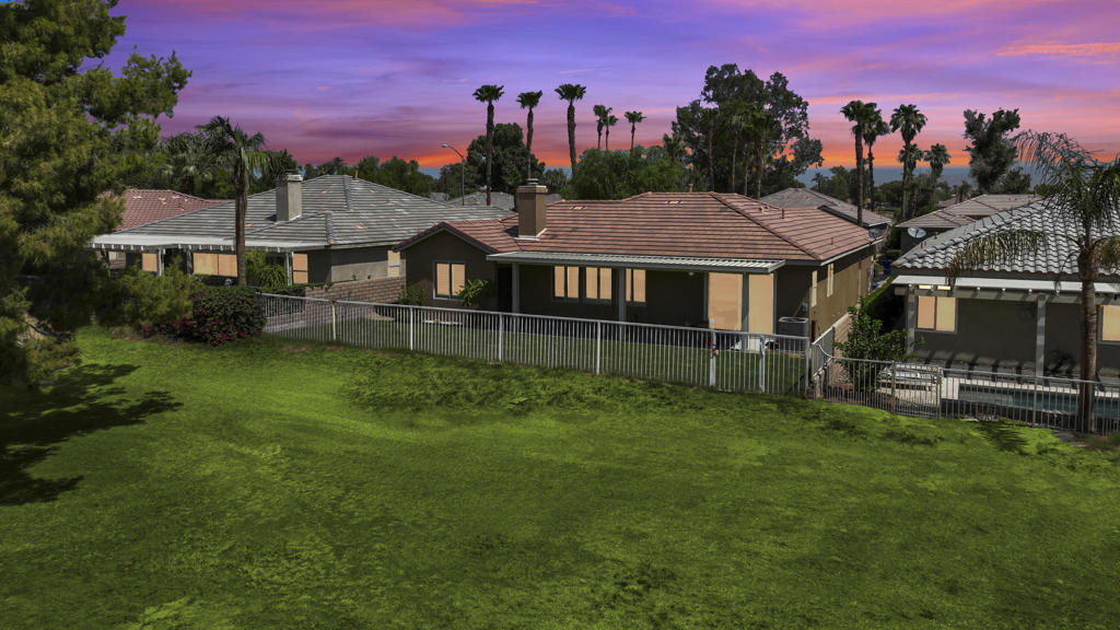 Vacation or staycation! Welcome to your desert oasis on the golf course in the desirable gated community of Indian Palms! Built in 2002, this beautifully updated home offers an open and airy floor plan with gorgeous views! The spacious master retreat is privately located and features backyard access, a generous walk-in closet, dual vanity, soaking tub, and separate shower. Enjoy seamless indoor-outdoor living with a new concrete covered patio and your lush green lawn with gated access to the golf course. Perfect for relaxing and bird watching or entertaining loved ones while taking in scenic Golf Course and Palm Springs Mountain Range views! Inside, tasteful finishes and accents, plantation shutters, perfectly painted and nice lighting create a fresh, bright, and welcoming vibe. Cozy up by the gas fireplace on cool desert evenings. This move-in ready home is ideally located just across from the Coachella and Stagecoach Festival Grounds along with The Empire Polo Club. Home to The Indian Palms Country Club and Resort also featuring resaurant dining, an event venue, pools including a salt water pool, hot tubs, 27- hole golf course, tennis, pickleball, bocce ball, fitness center, recreation galore, and even a boutique hotel for your guests. You'll love the extra deep tandem two-car garage offering space for your golf cart, bikes, or workshop needs. Live the resort lifestyle every day!
