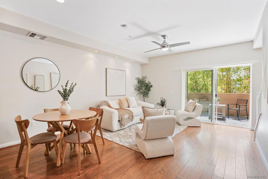 This move-in ready two-story condo in the heart of Bankers Hill offers unbeatable walkability and a stylish, low-maintenance lifestyle. Located in The Lodge, just steps from Hob Nob Hill, Balboa Park, Downtown, and Little Italy, this home is surrounded by some of San Diego's best dining, parks, and culture no car required. Inside, enjoy two spacious upstairs primary suites, each with their own bathroom and walk-in closets, plus a soaking tub in one and a chic sliding barn door in the other. The open-concept main level features walnut hardwood floors, a modern kitchen with granite counters and stainless steel appliances, a guest powder room, and full-size in-unit laundry. Two private patios and bonus storage closets, plus a shared bike closet add rare convenience. Secure tandem parking and elevator access make grocery runs a breeze. With community amenities like a gym and BBQ patio, plus quick access to freeways and the airport, this location offers the ultimate city-living experience perfect for those ready to live in one of San Diego's most walkable, vibrant neighborhoods. While this ground level unit adds convenience, take a walk up to the 4th floor for insane views of downtown, the harbor, and arriving planes to San Diego Airport.