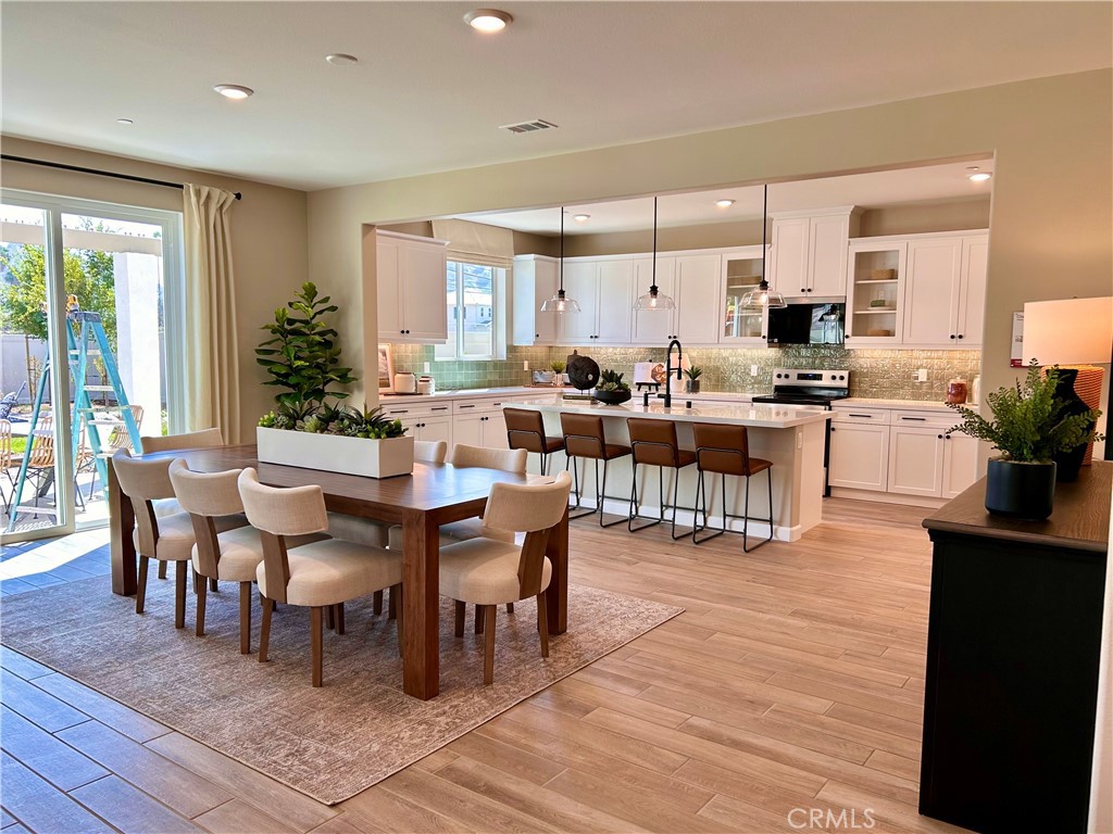 This brand new single-story home in Escondido is move-in ready and designed with everyday comfort and style in mind. Ask about limited-time incentives and flexible financing options that may help to reduce closing costs or monthly payments. "Move In Ready" means that this home is ready for a quick closing in September. It also means that the price is an "all in" price and includes over $75,000 of designer upgrades! Inside, you'll find 3 Bedrooms plus a dedicated Study — ideal for working from home or flexible living. The wide entry foyer leads into an open-concept layout featuring a spacious Great Room, a modern Kitchen with a large center island, walk-in pantry, and plenty of cabinet space. The Primary Suite is set at the back of the home for privacy, with a large walk-in closet and a spa-like Bath with dual vanities. Two secondary bedrooms, each with their own walk-in closets, are conveniently located near a full bath with dual sinks. There’s also a separate Powder Bath, Laundry Room, and a Stop and Drop area near the garage for added convenience. Built by Beazer Homes — the nation’s #1 builder of DOE-certified Zero Energy Ready Homes — this home includes features that support energy efficiency, better air quality (Indoor Air Plus certified), and long-term savings. Please note that pictures are of model home.