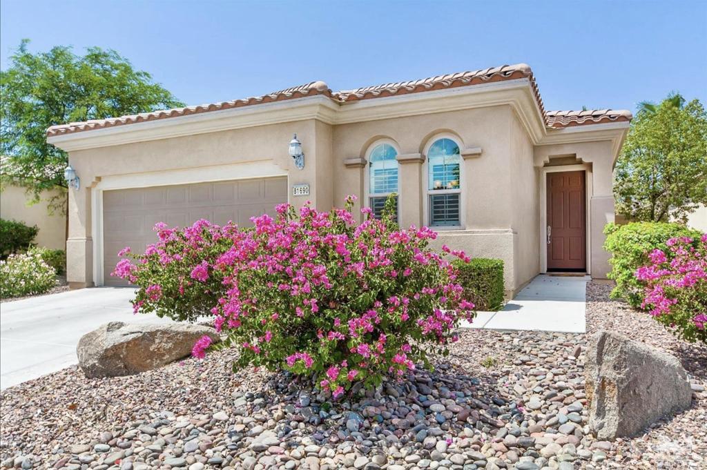 Offered long-term and unfurnished, with internet included, this spacious Montoya floor plan provides a comfortable and stylish desert lifestyle. The home features two bedrooms, two bathrooms, and a versatile den. The kitchen is upgraded with stainless steel appliances, granite countertops, a breakfast counter, and a large dining area, perfect for both casual meals and entertaining. The great room offers a mix of tile and carpet flooring, while an indoor laundry room and attached two-car garage add everyday convenience. A covered patio extends the living space outdoors, ideal for relaxing or hosting guests. Located within the desirable 55+ community of Sun City Shadow Hills, residents enjoy an abundance of amenities designed for an active and social lifestyle. Golf enthusiasts will appreciate the two golf courses, while additional recreation includes tennis, pickleball, bocce, billiards, and several resort-style pools. Fitness centers equipped with state-of-the-art equipment and two beautiful clubhouses provide bistros, meeting rooms, and spaces for games and community gatherings. With more than 50 clubs and activities available--covering art, literature, sports, photography, wine, food, theater, and more--there is something for every interest. For dining close to home, Shadows Restaurant offers a diverse menu, happy hours, Sunday brunch, and seasonal holiday celebrations. Gardener service and monthly HOA dues are included in the lease, making this an easy choice for those seeking a low-maintenance, amenity-rich lifestyle. The home is shown by appointment only.