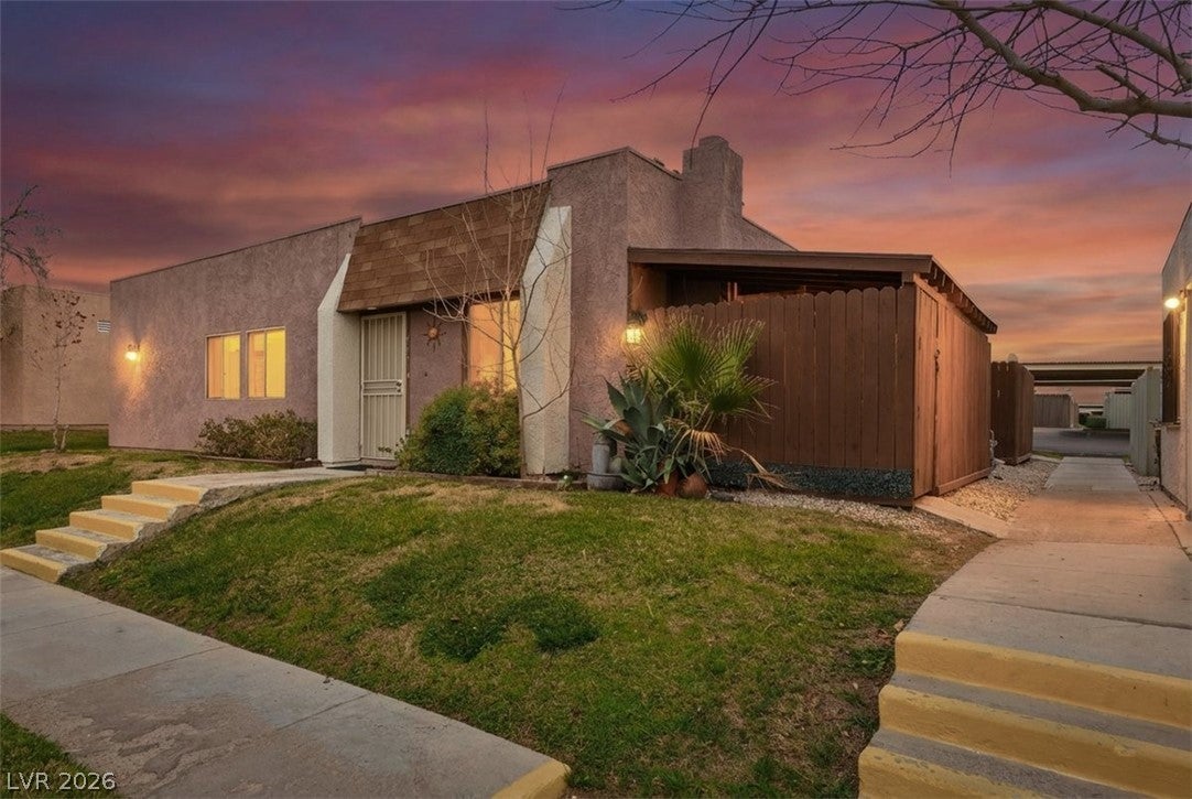 View of front of home featuring stucco siding