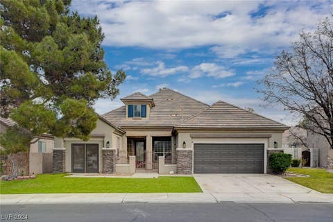 Photo of 1008 Greystoke Acres Street, Las Vegas, NV 89145 (MLS # 2552141)