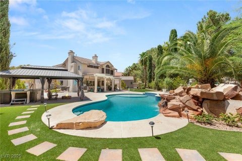 Photo of 9700 Falling Star Avenue, Las Vegas, NV 89117 (MLS # 2711189)
