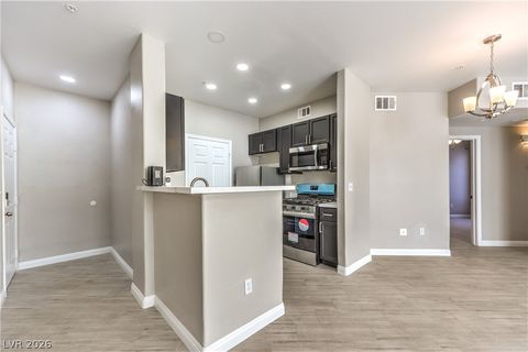 Photo of 7147 S Durango Drive #105, Las Vegas, NV 89113 (MLS # 2767813)