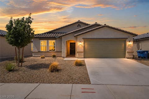 Photo of 297 Bridal Veil Falls Street, Indian Springs, NV 89018 (MLS # 2809824)