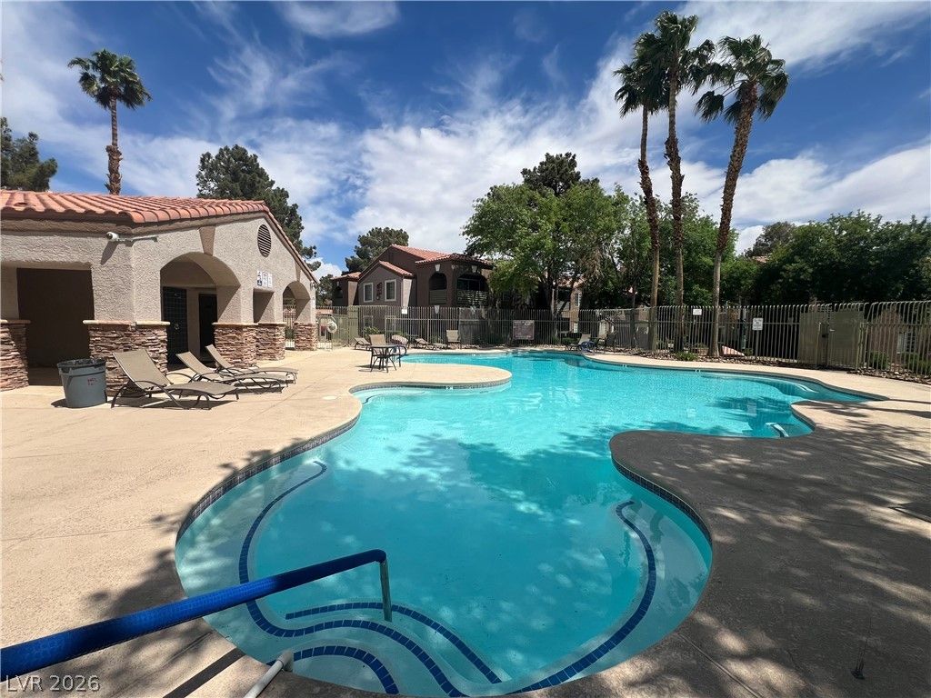 Photo of 7730 Secret Shore Drive #202, Las Vegas, NV 89128 (MLS # 2776682)