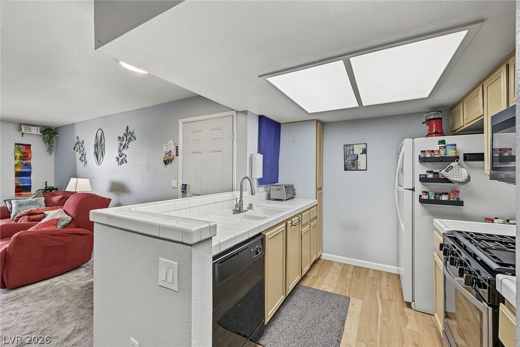 Photo of 1908 Mountain Hills Court #205, Las Vegas, NV 89128 (MLS # 2828880)