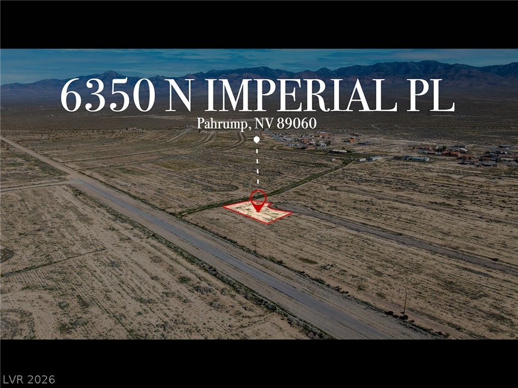 Aerial view of sparsely populated area featuring a