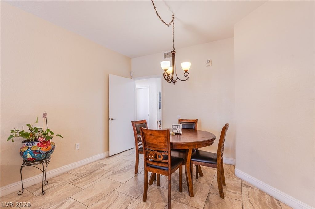 Photo of 6655 Caporetto Lane #104, North Las Vegas, NV 89084 (MLS # 2776032)